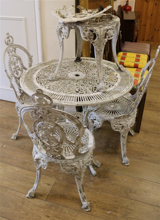 A garden table and four chairs W.78cm